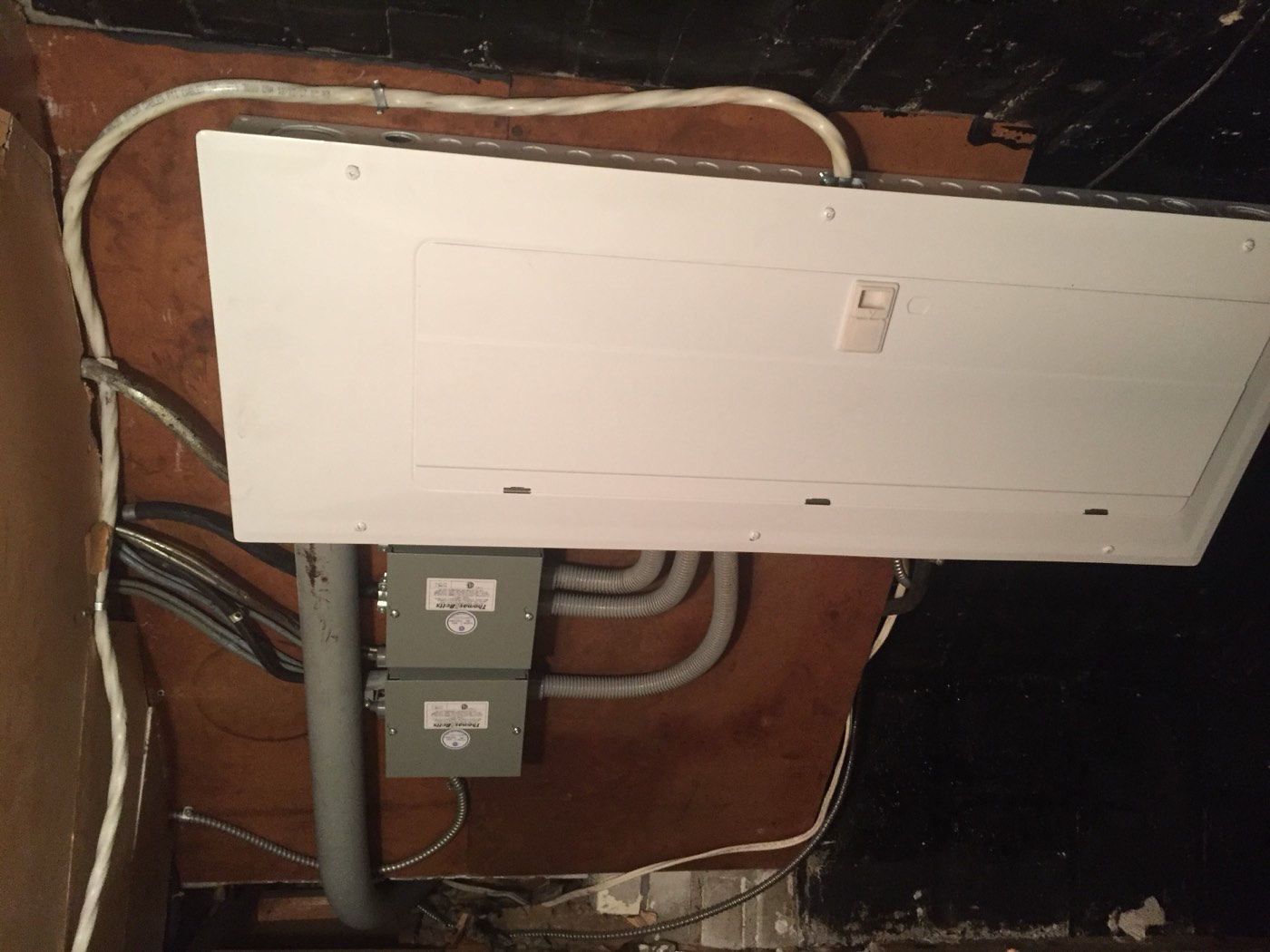 New electrical panel installed and closed up after a service upgrade